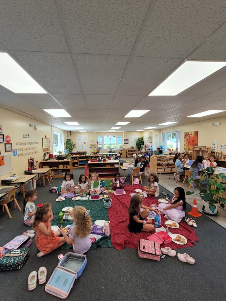 Primary class enjoying an indoor picnic