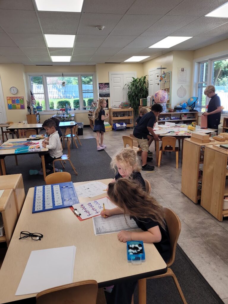 Primary student doing hands-on table work